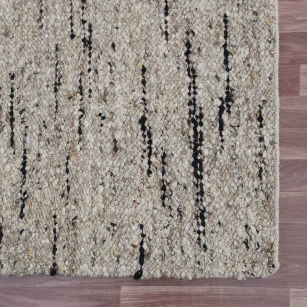 9' x 12' Beige and Black Abstract Hand Woven Area Rug