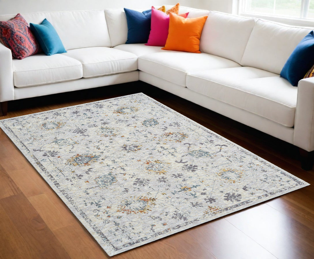 8' x 10' Ivory and Blue Floral Area Rug