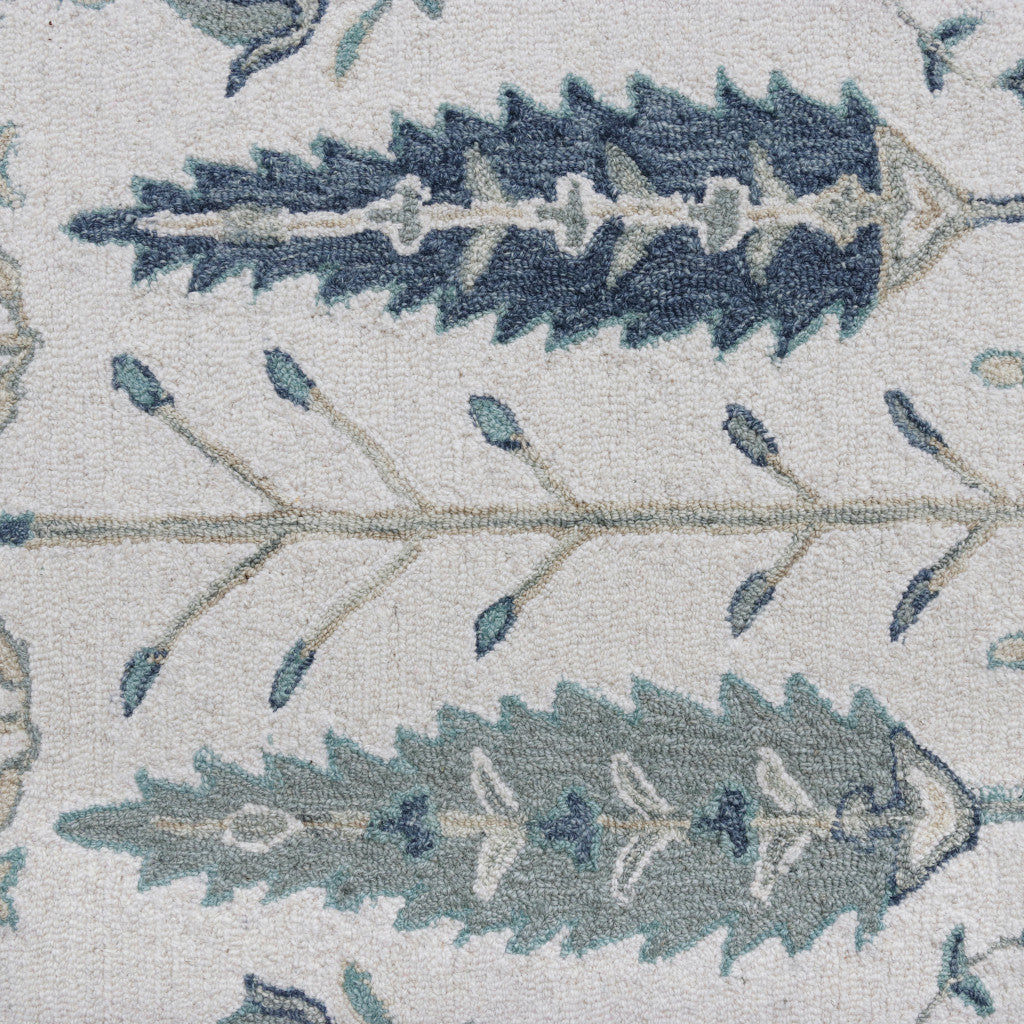 5' x 8' Ivory and Blue Wool Floral Hand Tufted Area Rug