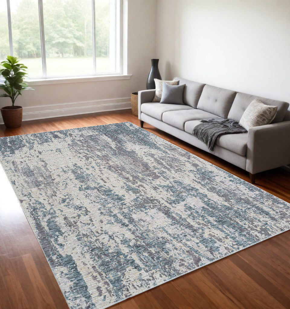 5' x 8' Gray and Ivory Abstract Area Rug