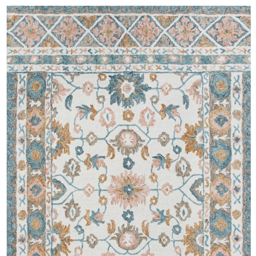 9' x 12' Blue and Ivory Wool Floral Hand Tufted Area Rug