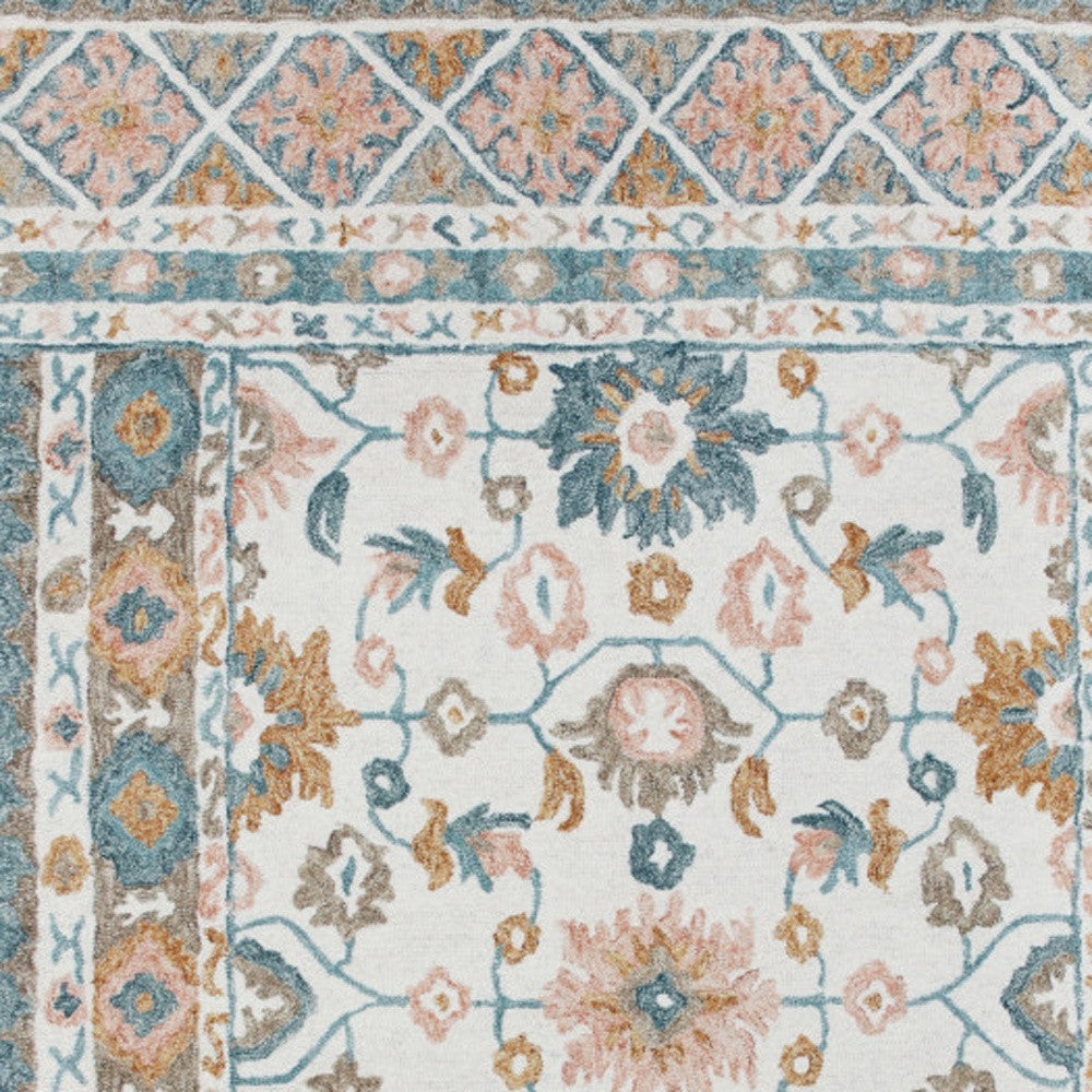 9' x 12' Blue and Ivory Wool Floral Hand Tufted Area Rug