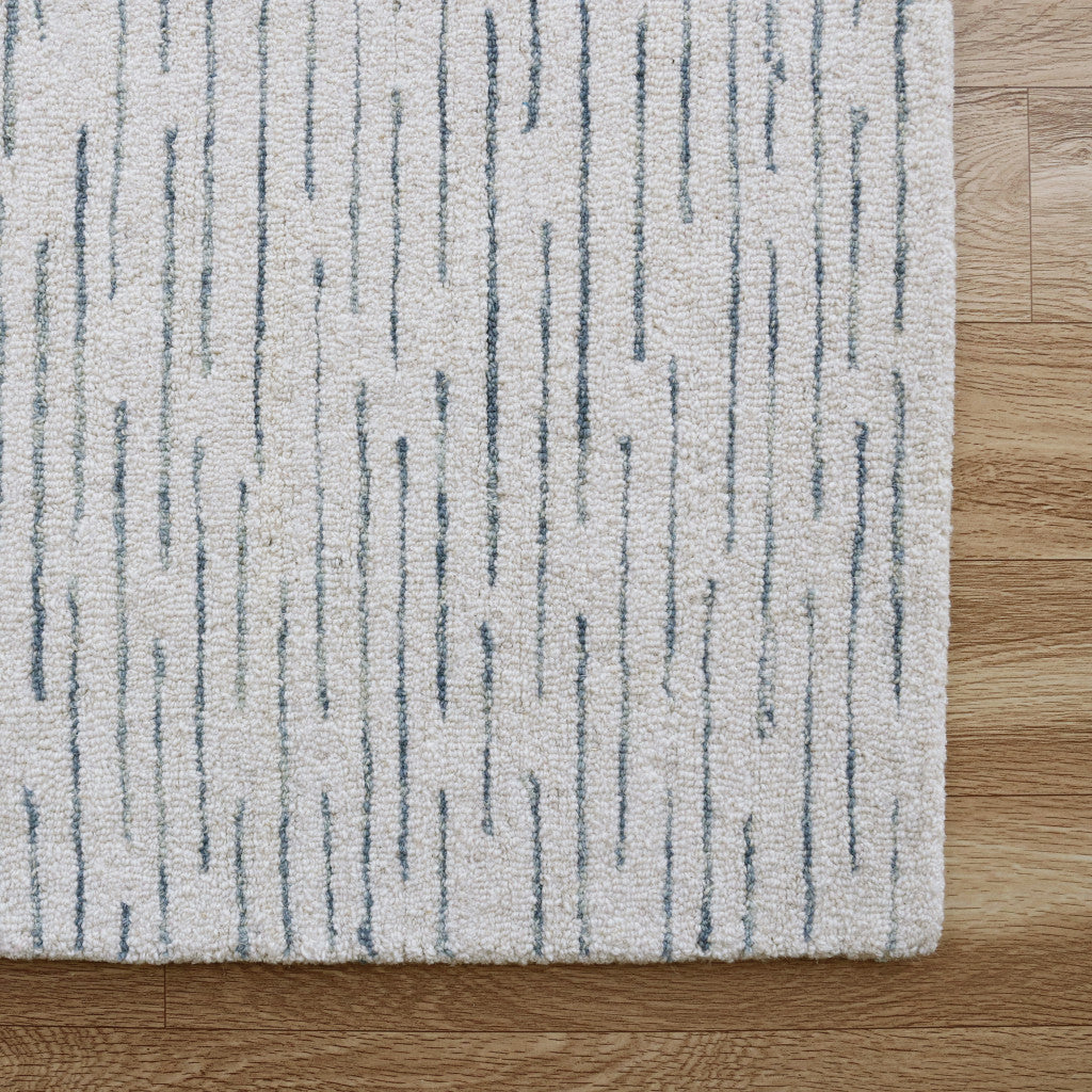 9' x 12' Ivory and Blue Wool Striped Hand Tufted Area Rug