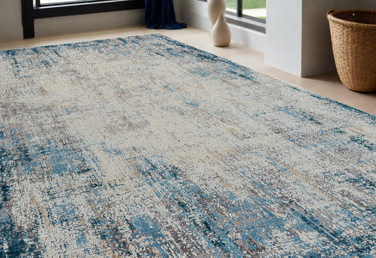 5' x 8' Blue and Ivory Abstract Area Rug