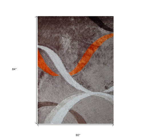 5' x 7' Brown and Orange Shag Hand Tufted Area Rug