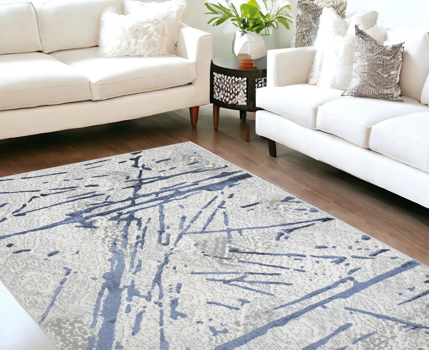 8' x 11' Ivory and Blue Abstract Area Rug