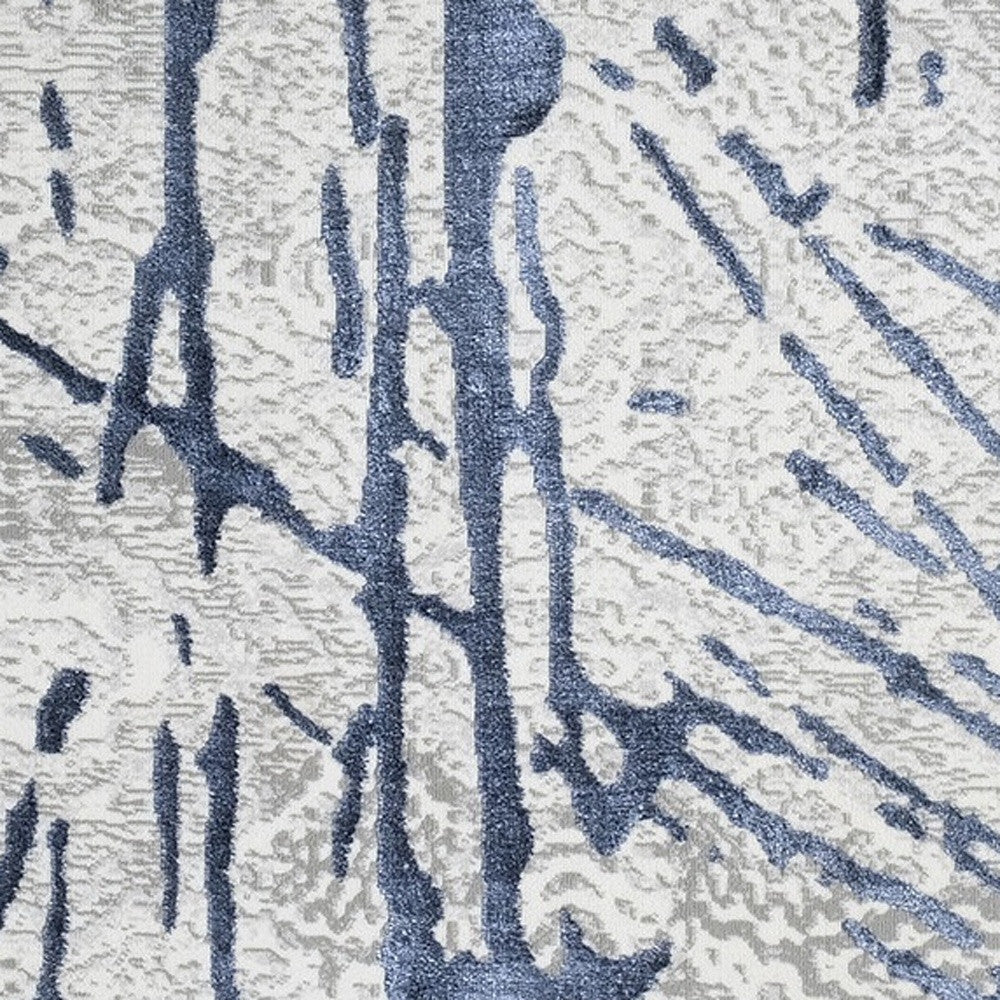 8' x 11' Ivory and Blue Abstract Area Rug