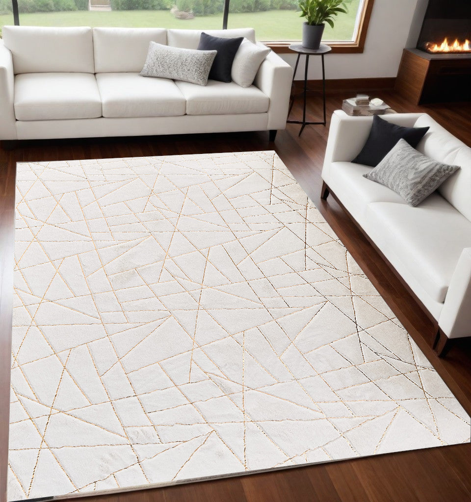 5' x 7' White and Gold Faux Fur Abstract Shag Non Skid Area Rug