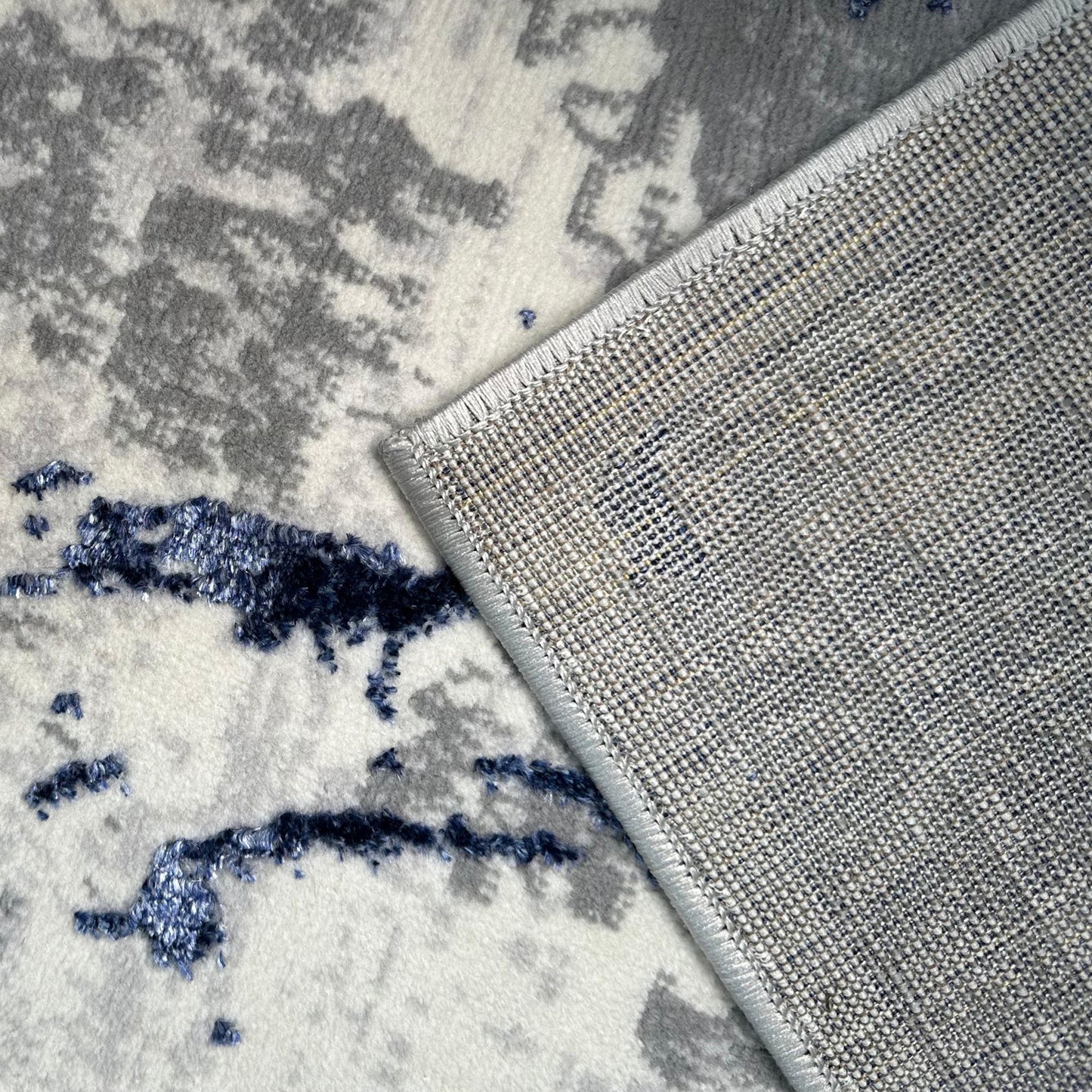 9' x 12' Ivory and Blue Abstract Area Rug