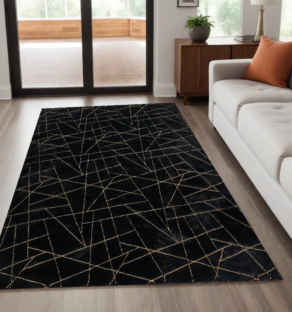 5' x 7' Black and Gold Faux Fur Abstract Shag Non Skid Area Rug