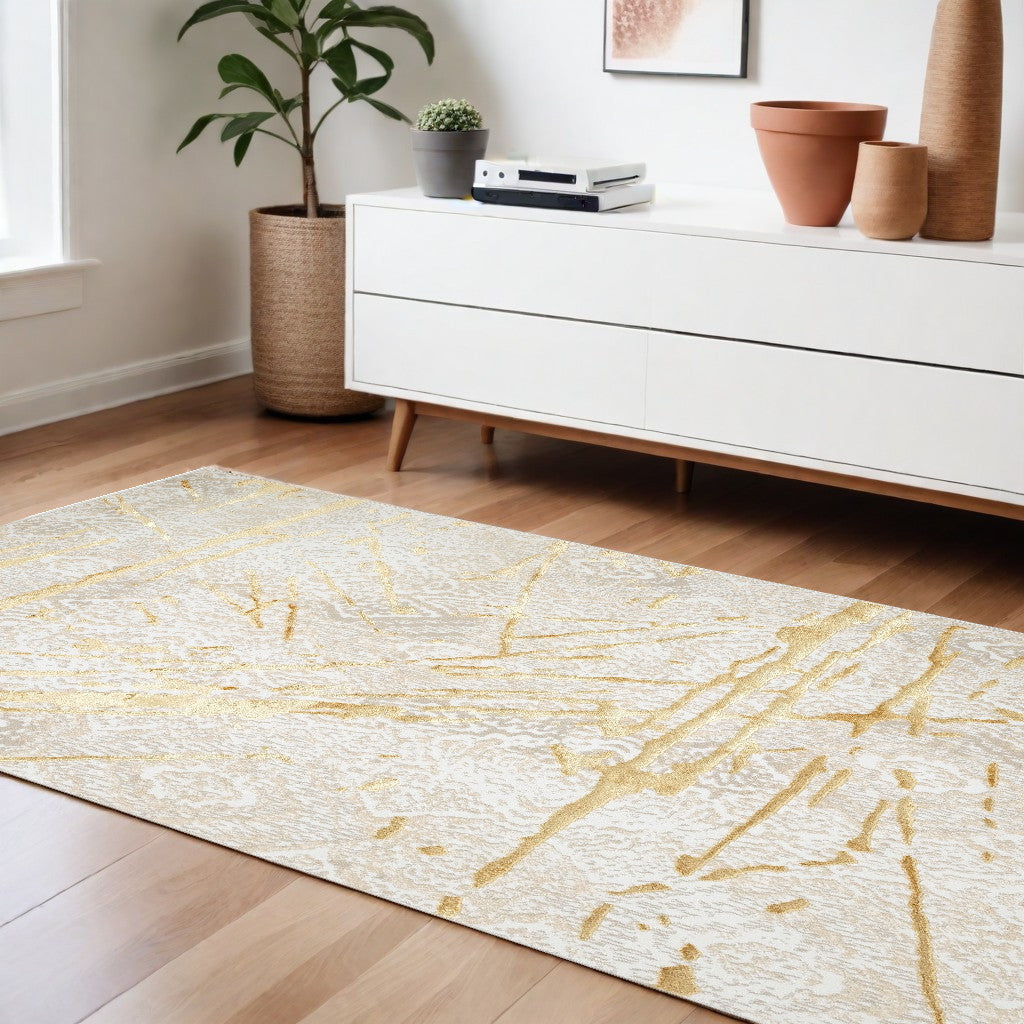 8' x 11' Ivory and Gold Abstract Area Rug