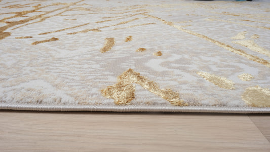 5' x 8' Ivory and Gold Abstract Area Rug