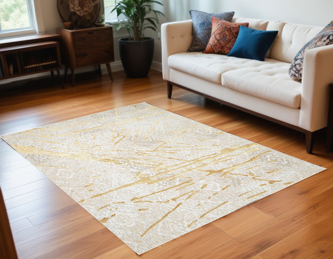 5' x 8' Ivory and Gold Abstract Area Rug