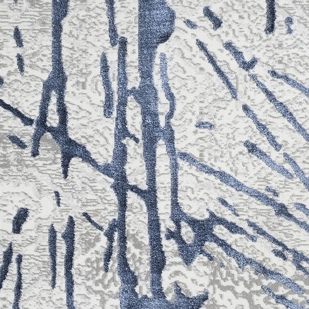 4' x 6' Ivory and Blue Abstract Area Rug