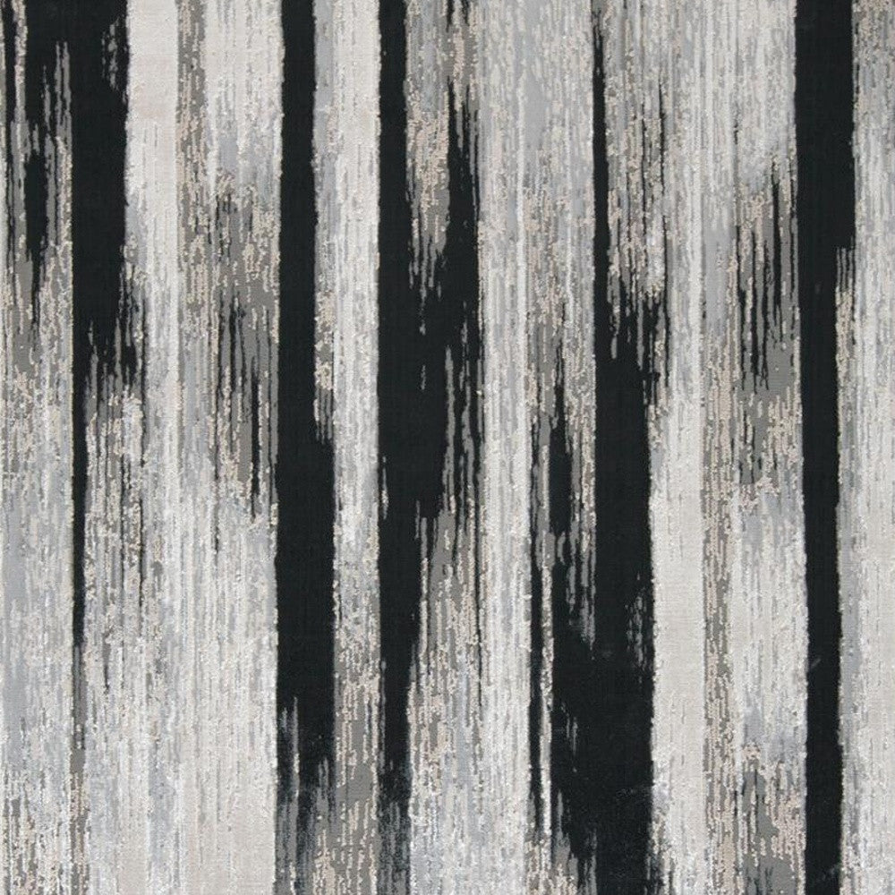 7' x 10' Black Silver and Gray Abstract Power Loom Area Rug