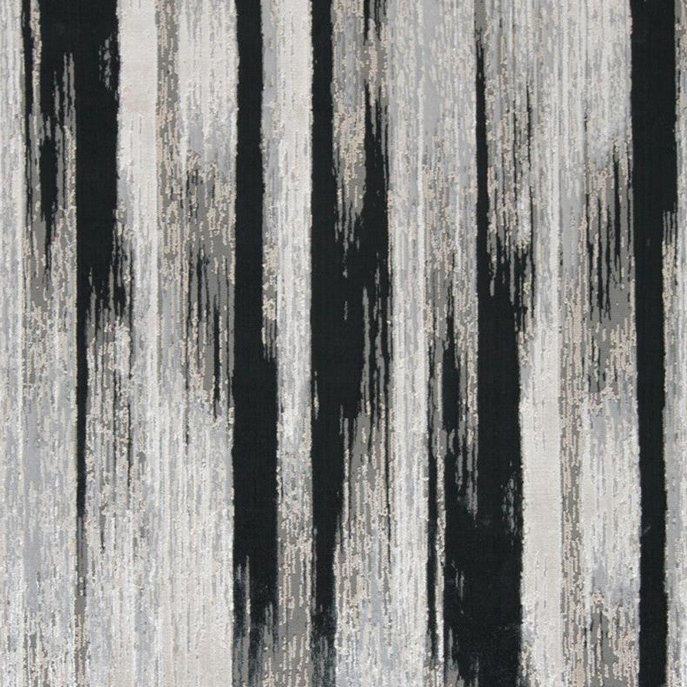 2' x 3' Black Silver and Gray Abstract Power Loom Area Rug