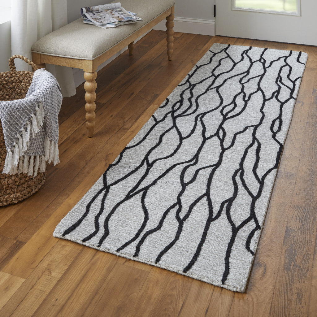 8' Black and Taupe Abstract Hand Tufted Runner Rug