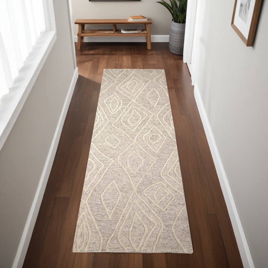 8' Ivory and Tan Geometric Hand Tufted Runner Rug