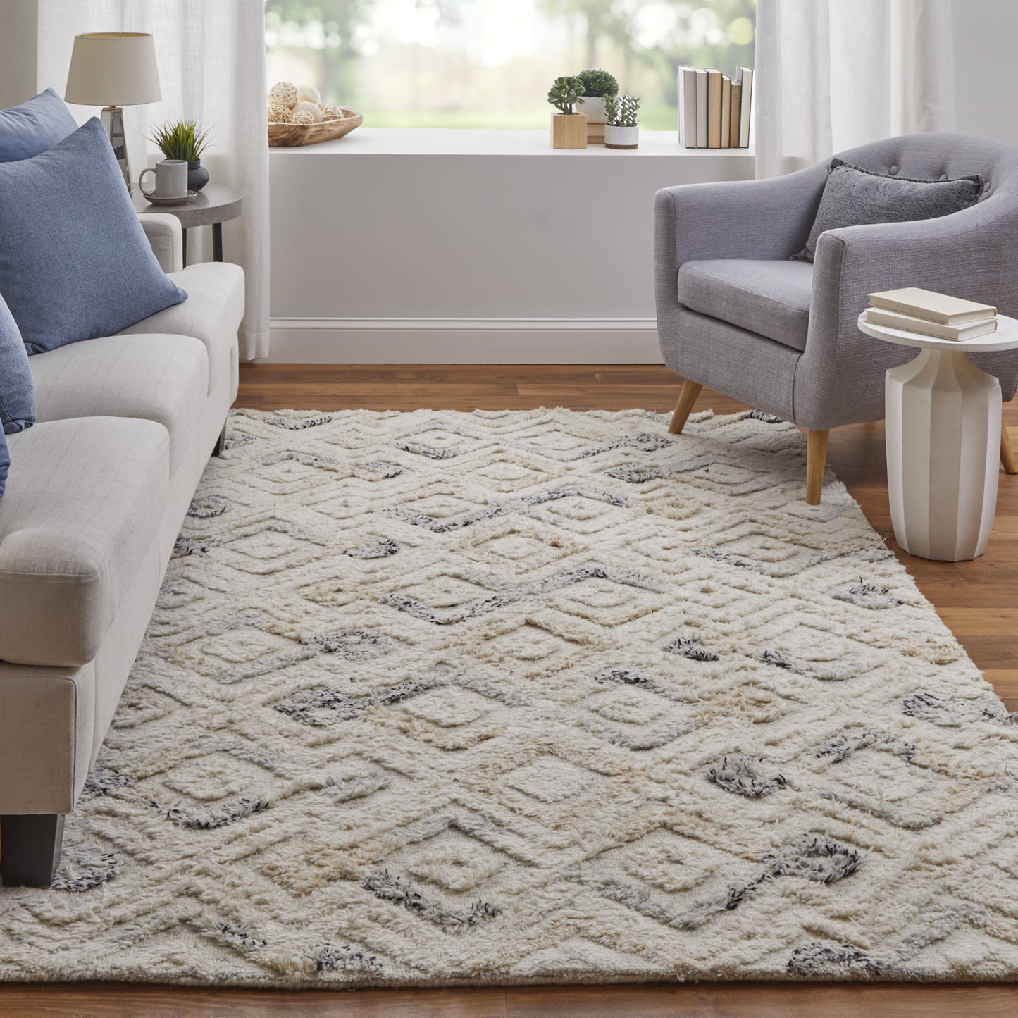 5' x 8' Gray and Ivory Geometric Hand Tufted Area Rug