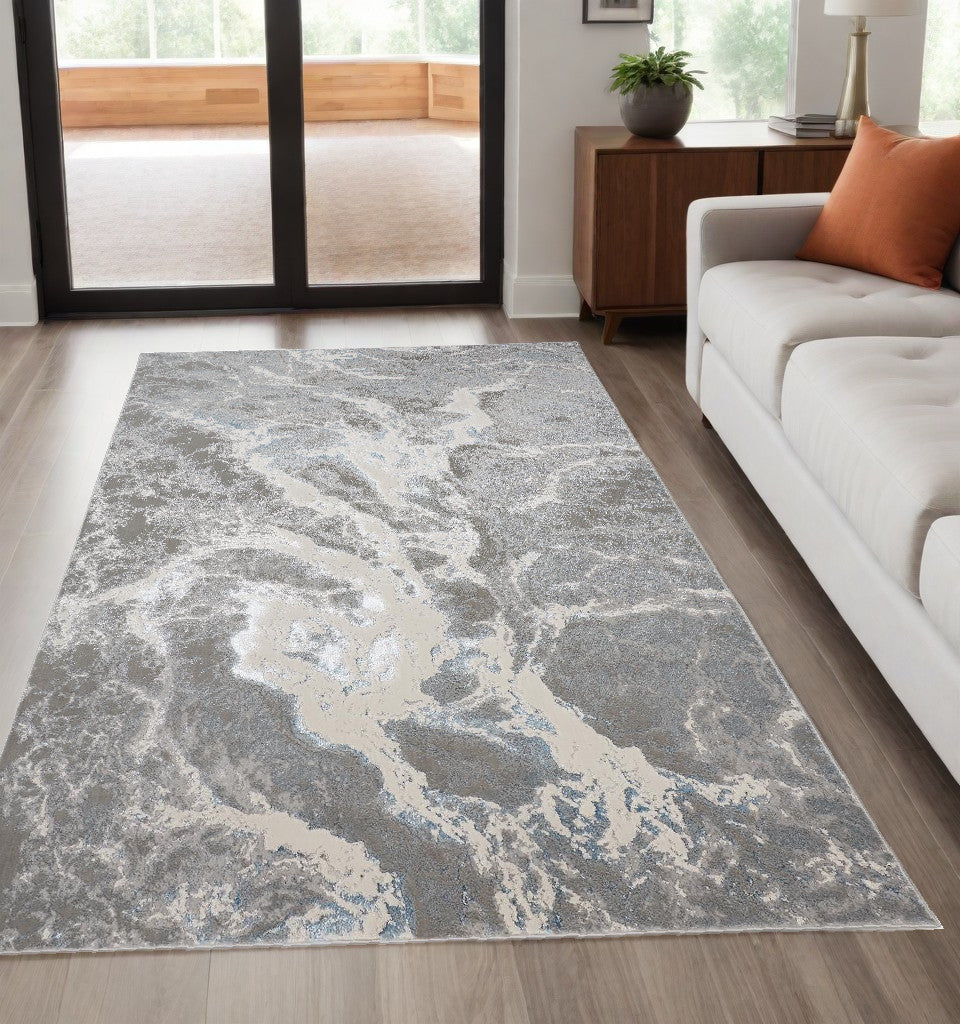 5' x 8' Gray and Ivory Abstract Power Loom Area Rug