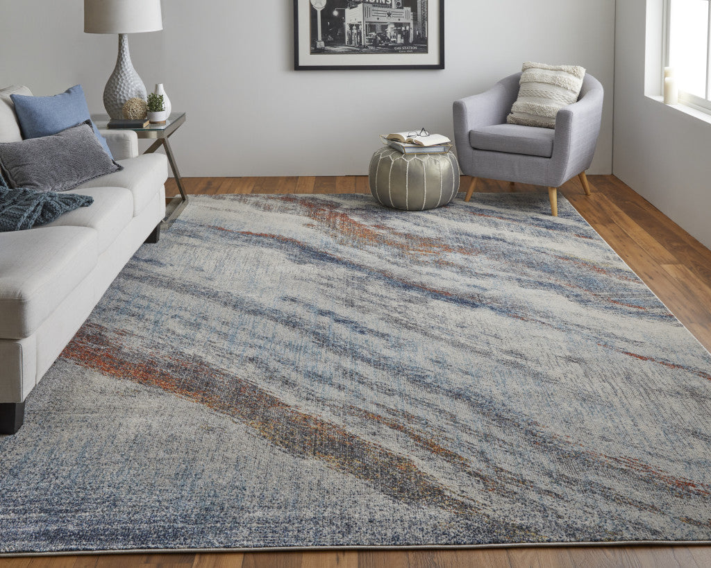 7' x 10' Ivory Blue and Orange Abstract Power Loom Area Rug