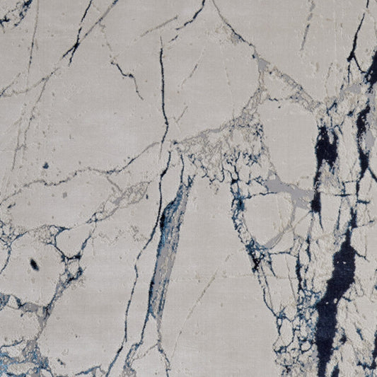8' x 10' Ivory and Blue Marble Power Loom Distressed Area Rug