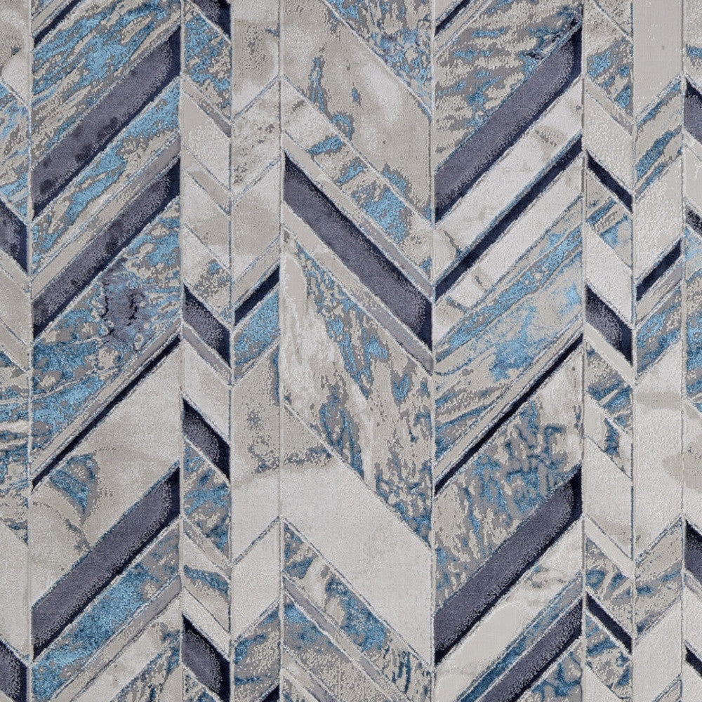 4' x 6' Ivory and Blue Chevron Power Loom Distressed Area Rug