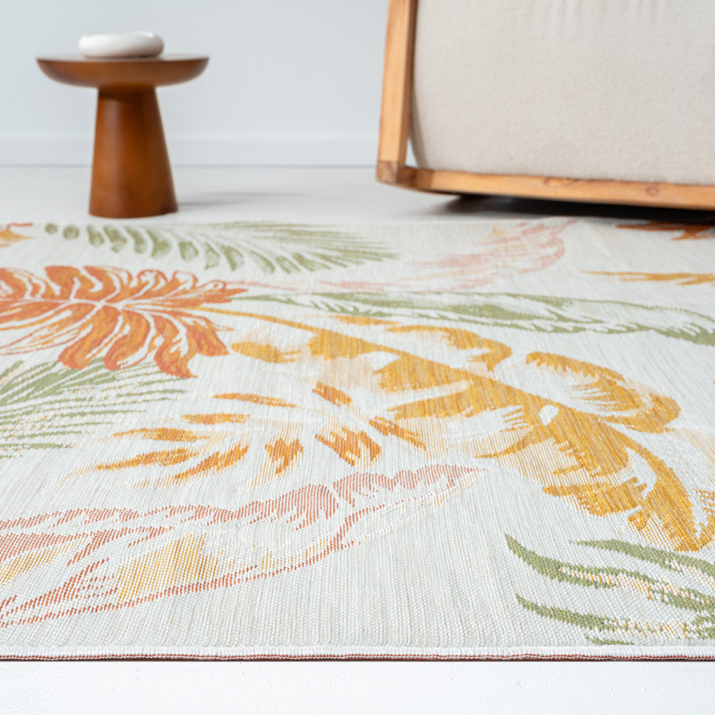 2' x 3' Ivory Green and Orange Palm Leaf Stain Resistant Indoor Outdoor Area Rug