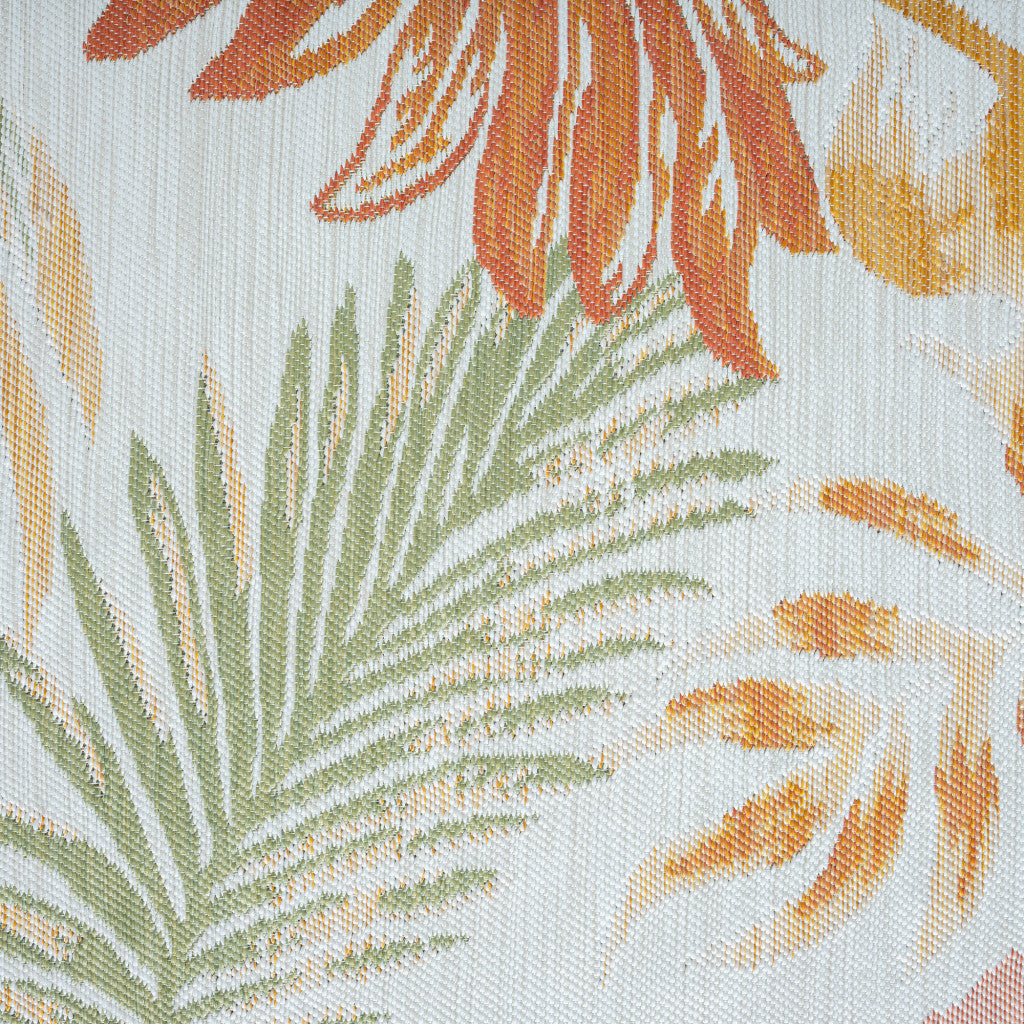 2' x 3' Ivory Green and Orange Palm Leaf Stain Resistant Indoor Outdoor Area Rug