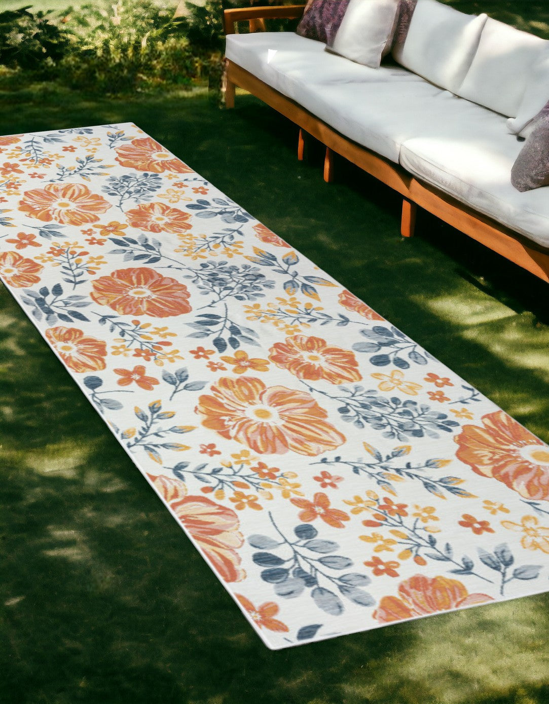 2' X 8' Ivory Orange and Blue Floral Stain Resistant Indoor Outdoor Runner Rug