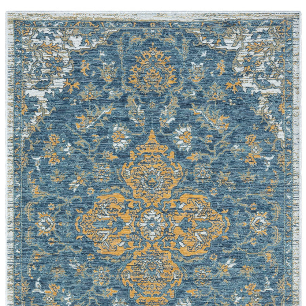 5' x 7' Blue and Ivory Medallion Stain Resistant Indoor Outdoor Area Rug