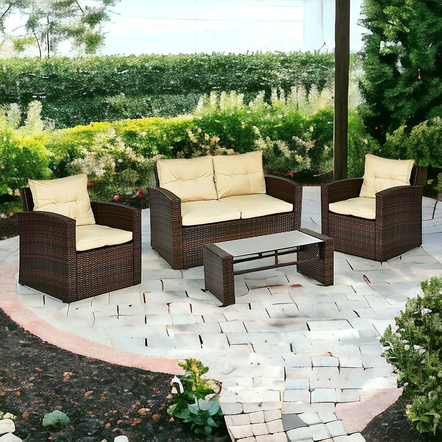 Four Piece Outdoor Brown Wicker Sofa Seating Group with Beige Cushions