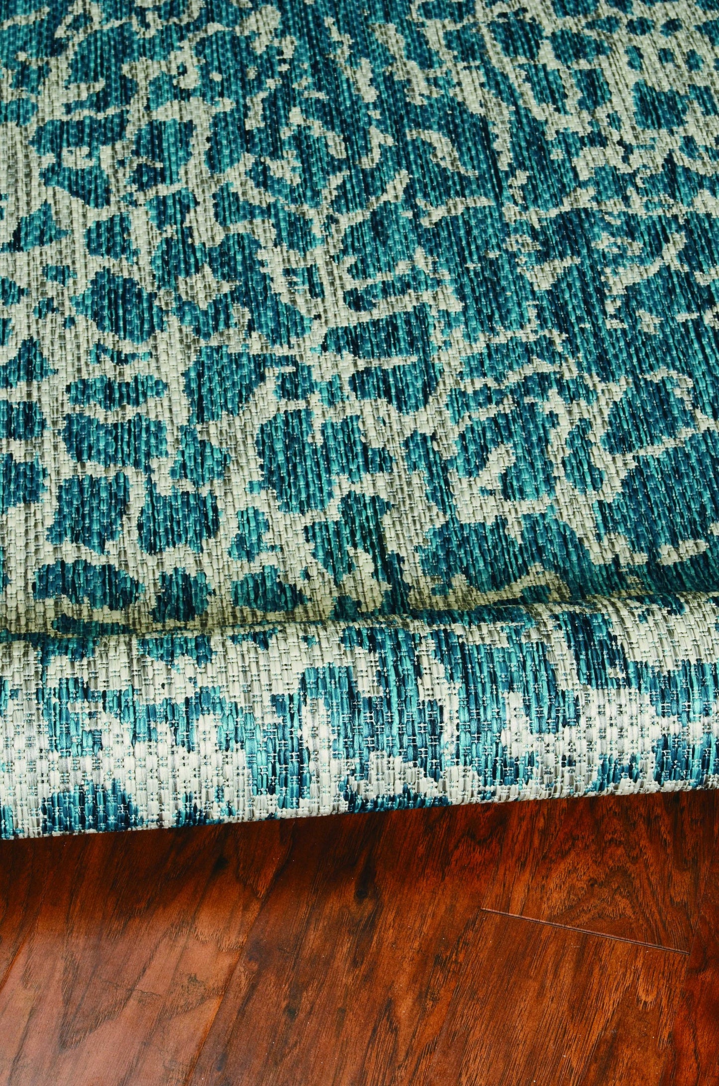 5' X 8'  Teal Animal Print Outdoor Area Rug